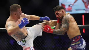 Ilia Topuria reacts after suffering the first loss of his career against Justin Gaethje