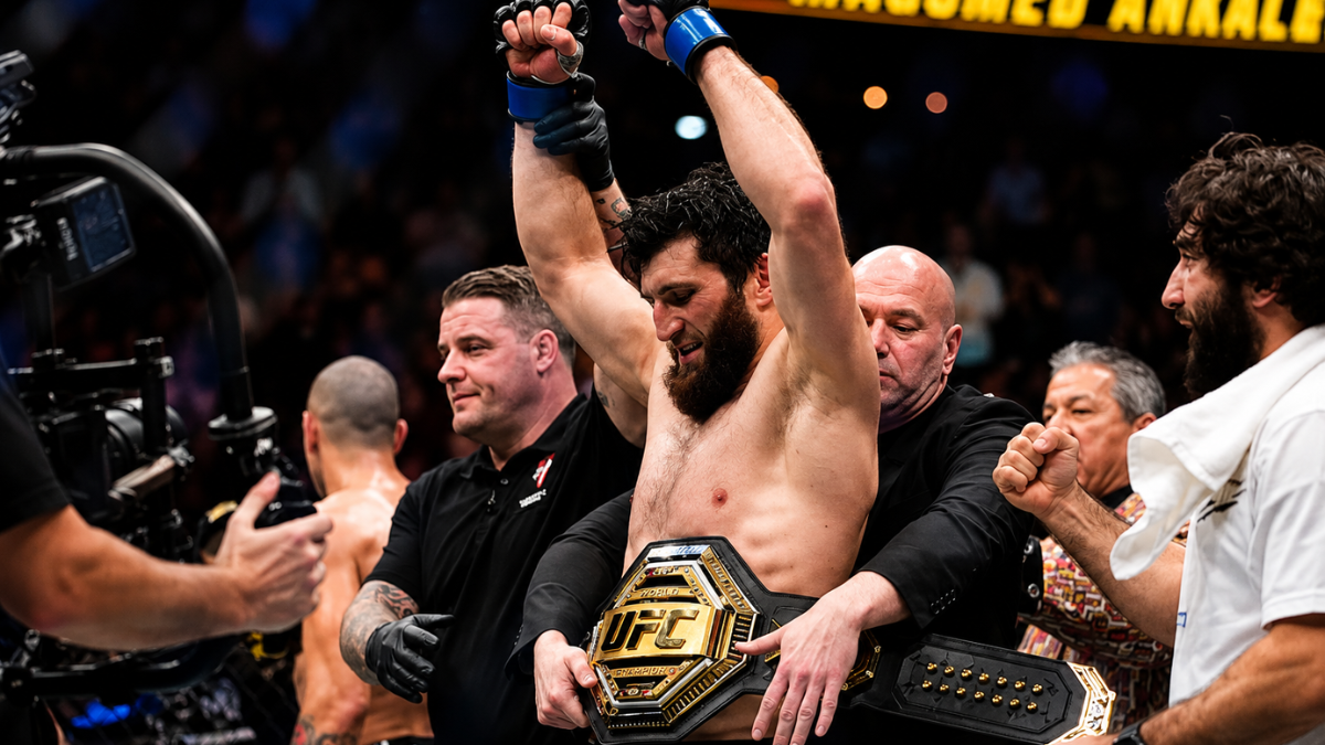 Magomed Ankalaev celebrating a win inside the UFC Octagon