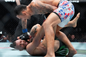 Conor McGregor reacting after his knee injury at UFC 329 against Max Holloway.