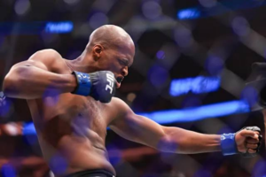 Michael Page celebrates a win inside the octagon ahead of his UFC Paris announcement.