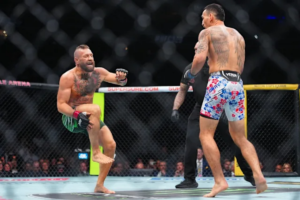 Conor McGregor's knee injury moment during UFC 329 against Max Holloway.