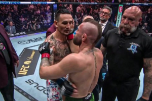 Conor McGregor reacts in shock after his UFC 329 loss to Max Holloway.